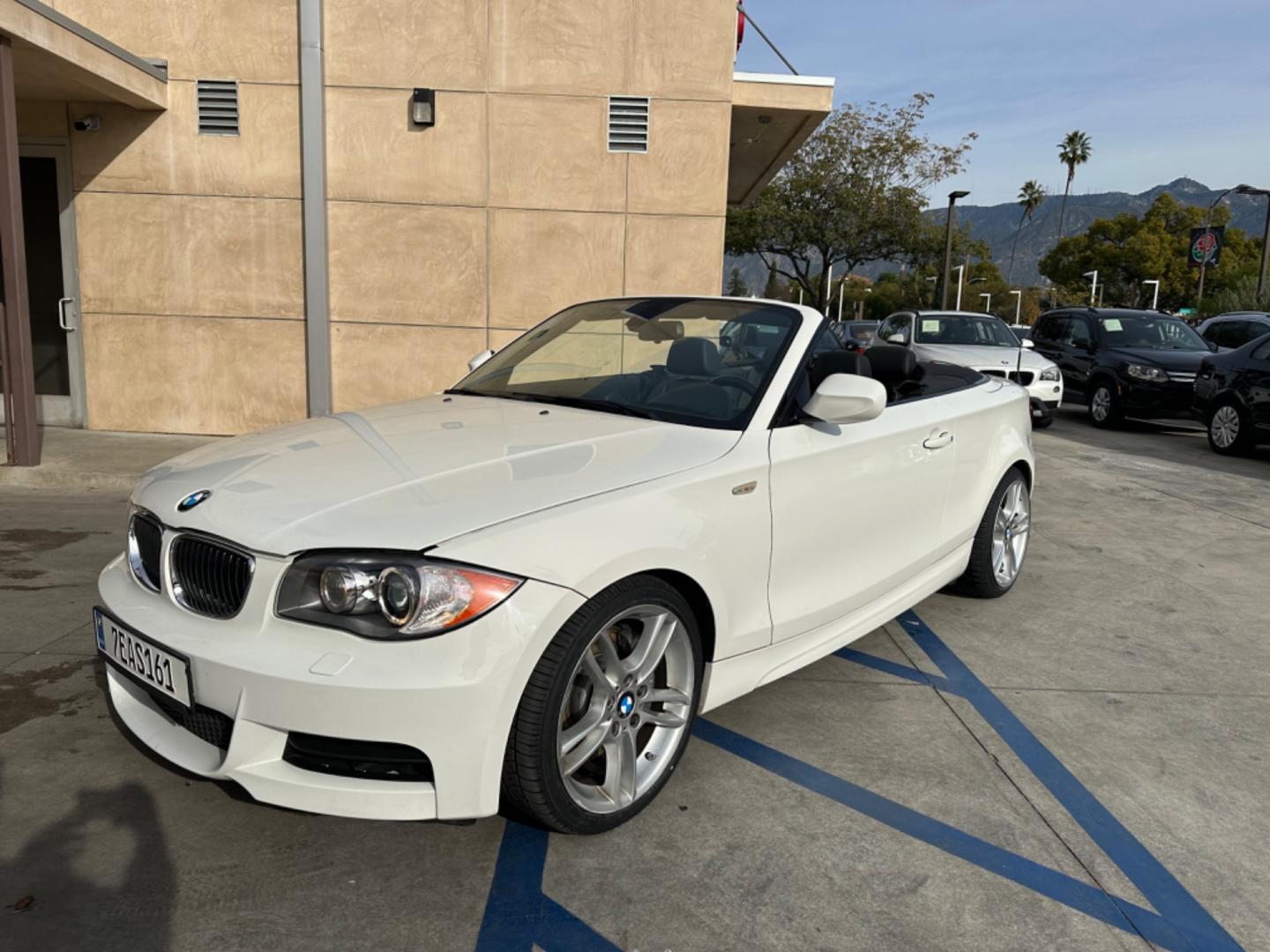 2011 WHITE /Black BMW 1-Series 135i Convertible (WBAUN7C56BV) with an 3.0L L6 DOHC 24V engine, Automatic transmission, located at 30 S. Berkeley Avenue, Pasadena, CA, 91107, (626) 248-7567, 34.145447, -118.109398 - Experience the Ultimate Driving Pleasure: 2011 BMW 135i Convertible Now Available in Pasadena, CA Discover the thrill of open-air driving with the 2011 BMW 135i Convertible, a perfect blend of luxury and performance, now featured at our BHPH dealership in Pasadena, CA. This exquisite convertible - Photo#14